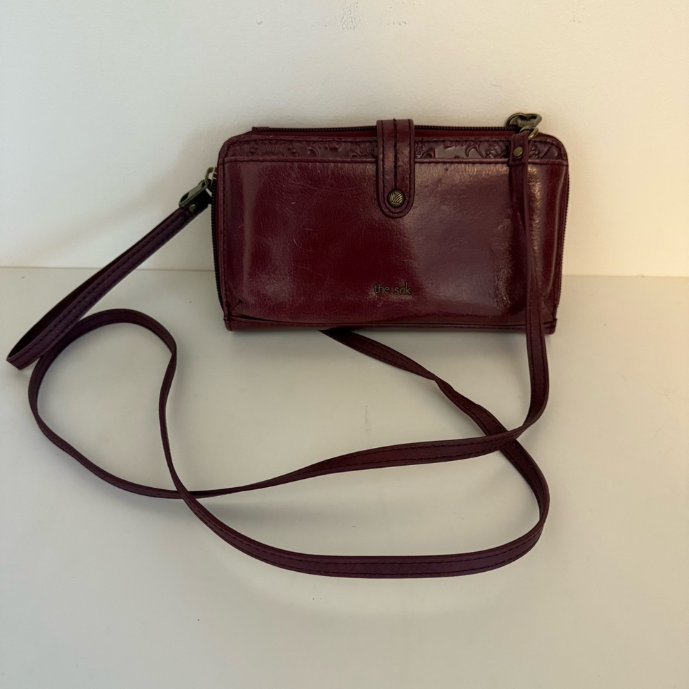 The sak Maroon Leather Clutch Zip Around Embossed Wristlet Crossbody Purse